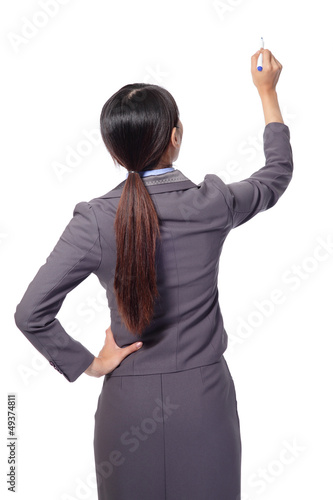 Photo: business woman standing to the back side business woman standing to the back side