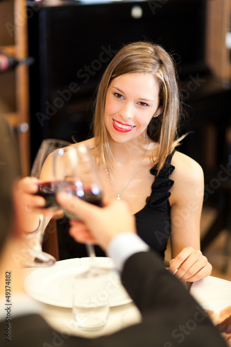 Photo: Couple toasting red wine Couple toasting red wine