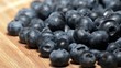 Rotating Blueberries on a wooden plate