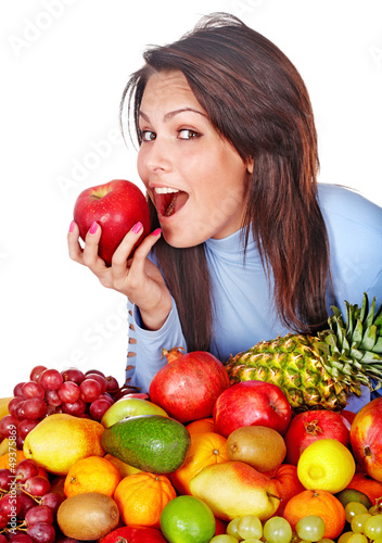 Photo: Girl with group of fruit and vegetables. Girl with group of fruit and vegetables.