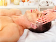 Man getting  facial massage .