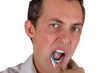 Photo: man brushing his teeth man brushing his teeth