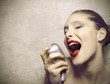 Photo: Performance of a beautiful woman singer Performance of a beautiful woman singer