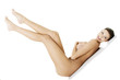 Sexy fit naked woman lying down