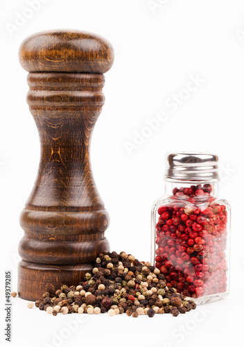 Photo: salt shaker and spices isolated on white salt shaker and spices isolated on white