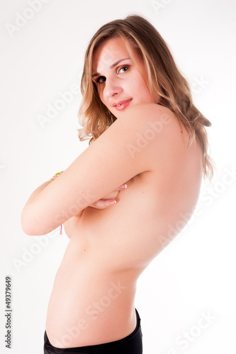 Photo: topless woman body covering her breasts topless woman body covering her breasts