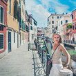 Photo: Beautful Girl Is Stadning By the River in Venice, Italy Beautful Girl Is Stadning By the River in Venice, Italy