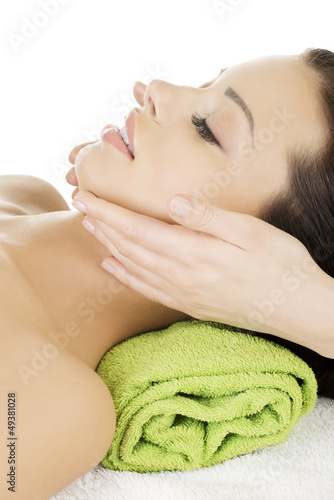 Photo: Face massage therapy at spa saloon Face massage therapy at spa saloon