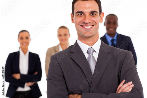 Photo: handsome businessman and team isolated on white handsome businessman and team isolated on white