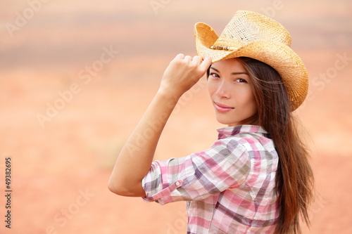 Photo: Young american cowgirl woman Young american cowgirl woman