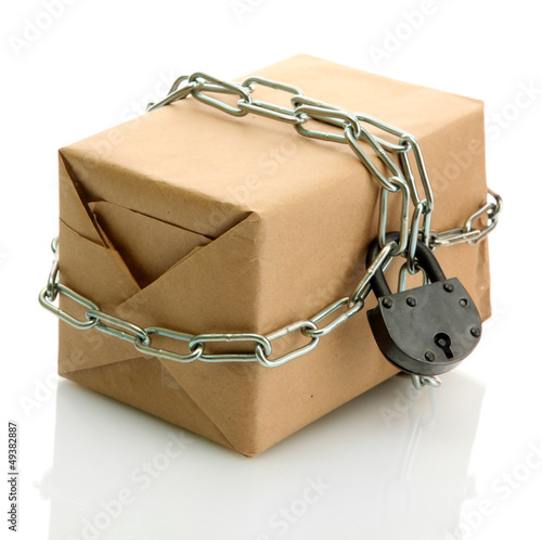 Photo: parcel with chain and padlock, isolated on white parcel with chain and padlock, isolated on white