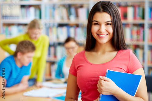 Photo: Student with copybook Student with copybook