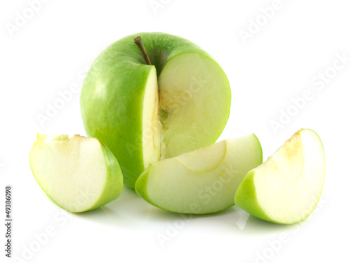 Photo: Isolated sliced green apple with three slices. Isolated sliced green apple with three slices.