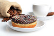 cup of coffee and sweet donut