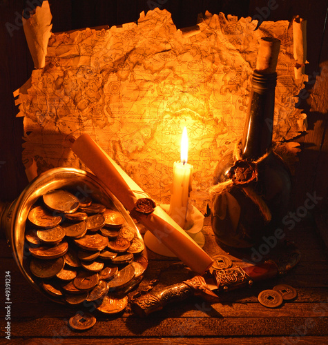 Photo: Pirate treasures with candle Pirate treasures with candle