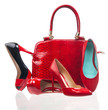 Red fashion women shoes and handbag over white