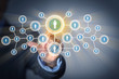 Image of male touching icon of social network