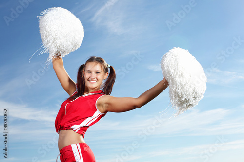 Photo: Young female cheerleader Young female cheerleader