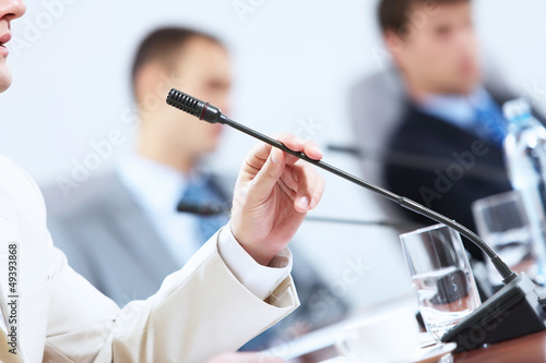 Photo: Three businesspeople at meeting Three businesspeople at meeting