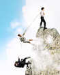 Three business people pulling rope