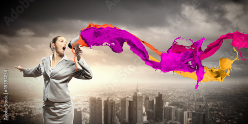 Photo: businesswoman with megaphone businesswoman with megaphone