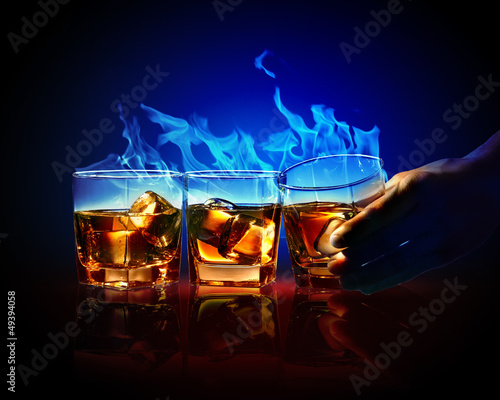 Photo: Three glasses of burning yellow absinthe Three glasses of burning yellow absinthe