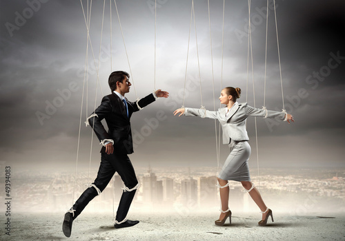 Photo: Puppet businesspeople Puppet businesspeople