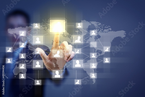 Photo: Image of male touching icon of social network Image of male touching icon of social network