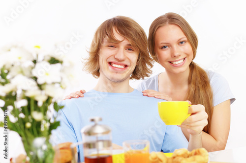 Photo: Couple at home drinking tea Couple at home drinking tea