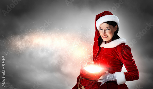 Photo: beautiful girl in santa costume beautiful girl in santa costume