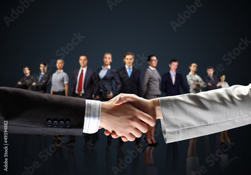 Photo: image of business handshake image of business handshake