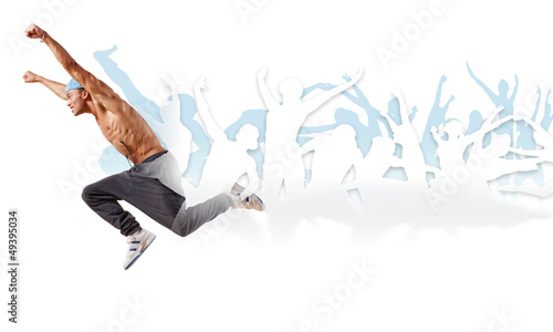 Photo: young man dancing hip hop with color lines young man dancing hip hop with color lines