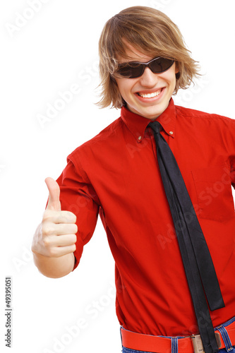 Photo: Happy handsome man showing thumbs up Happy handsome man showing thumbs up
