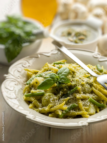 Photo: pesto trofie typical genoa recipe, selective focus pesto trofie typical genoa recipe, selective focus