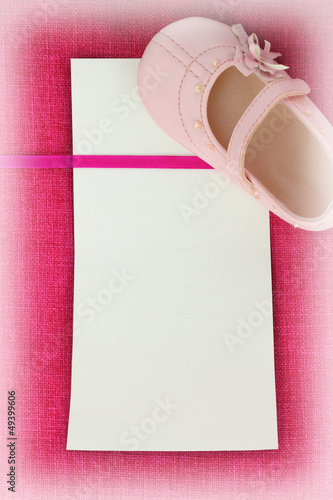 Photo: Empty card on pink fabric texture Empty card on pink fabric texture