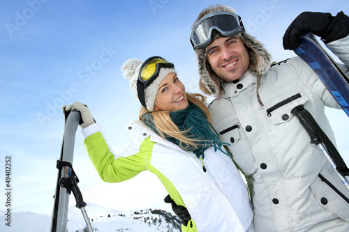 Photo: Cheerful couple enjoying winter vacation Cheerful couple enjoying winter vacation
