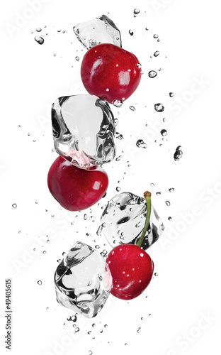 Photo: Fresh cherries with ice cubes, isolated on white background Fresh cherries with ice cubes, isolated on white background