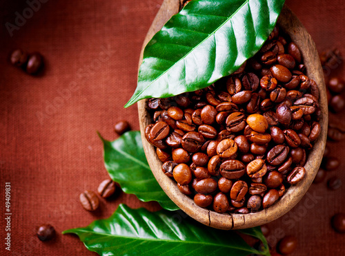 Photo: Coffee beans. Bowl of Aromatic Coffee close-up Coffee beans. Bowl of Aromatic Coffee close-up