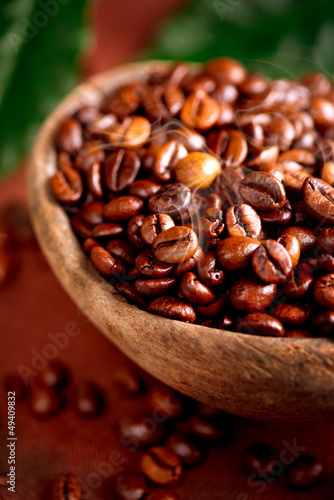 Photo: Coffee beans. Bowl of Aromatic Coffee close-up Coffee beans. Bowl of Aromatic Coffee close-up