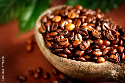Photo: Coffee beans. Bowl of Aromatic Coffee close-up Coffee beans. Bowl of Aromatic Coffee close-up