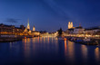 Zurich city center viewed from the river by night