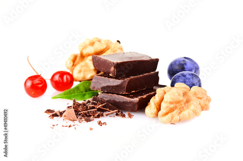 Photo: a handful of blueberries and slices of chocolate a handful of blueberries and slices of chocolate