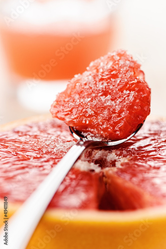 Photo: Citrus dessert - red grapefruit with sugar Citrus dessert - red grapefruit with sugar