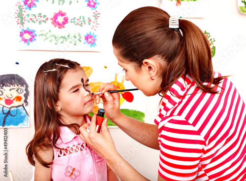 Photo: Child preschooler with face painting. Child preschooler with face painting.