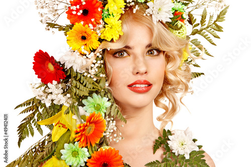 Photo: Woman with make up and flower. Woman with make up and flower.