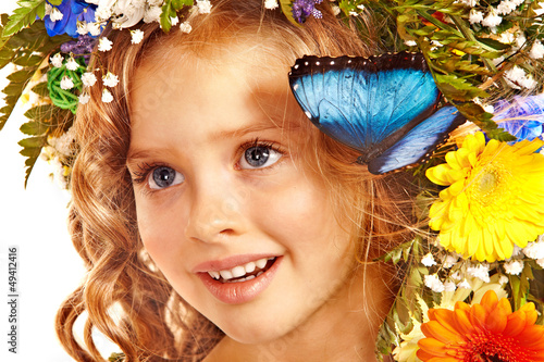 Photo: Child with butterfly and flower. Child with butterfly and flower.