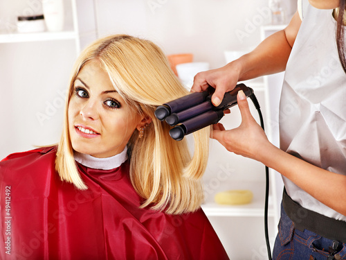 Photo: Woman at hairdresser. Woman at hairdresser.
