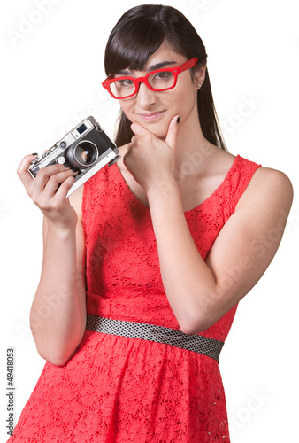 Photo: Pensive Woman with Camera Pensive Woman with Camera