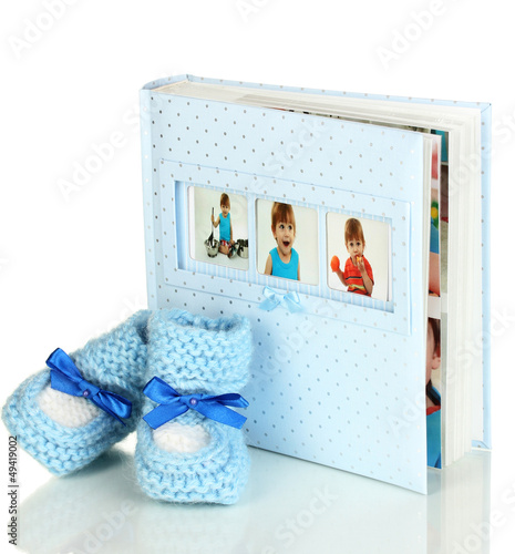 Photo: Baby photo album isolated on white Baby photo album isolated on white