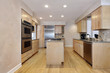 Kitchen with wood cabinetry
